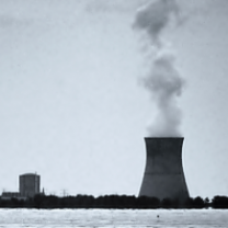 Nuke plant on the water with smoke