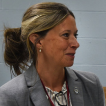 White woman with her hair pulled back