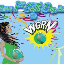 Women with the earth in her hands and words Happy 1st Earth Day Birthday WGRN