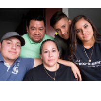 Edith surrounded by four other Latino people