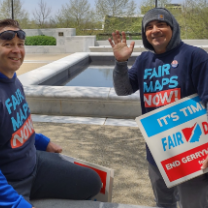 Guy with Fair Districts sign