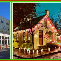 House with Christmas lights and a big flat building