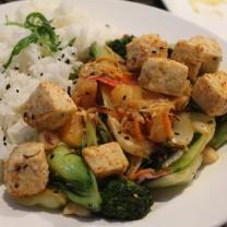 Tofu with grilled vegetables, and macadamia nuts.