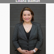 Young dark haired woman smiling