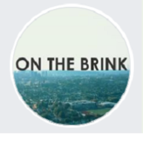 Words On the Brink above a city scene