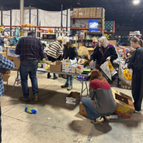 People in a food warehouse packing