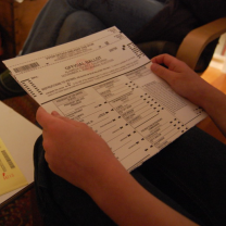 Person looking at ballot