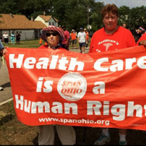 People with sign Health Care is a Human Right
