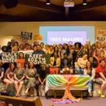 Lots of people posing with Keep Edith Home signs