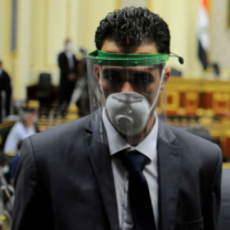 Man in mask and face shield