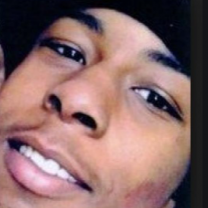 Close up of black man's face smiling