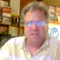 White man with glasses