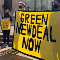 Sign saying Green New Deal Now