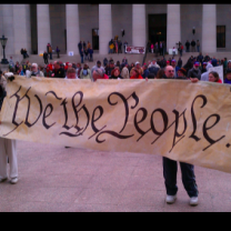 Sign saying We The People