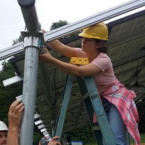 Woman installing solar