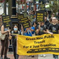 People with banners and signs