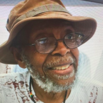 Black man wearing a hat