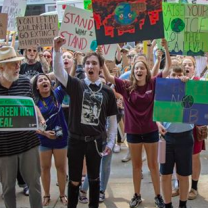 Students outside at a rally