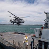 Helicoper landing on naval ship