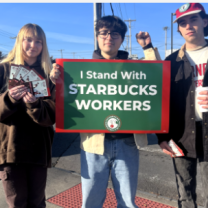Three young people standing with sign saying I stand with Starbucks workers
