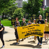 People marching for mass transit