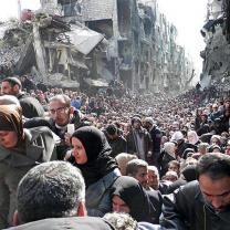 Bombed building and Syrian people fleeing