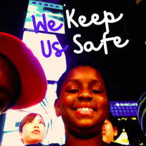 Young immigrant kids with word We keep us safe