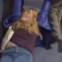 Woman being dragged