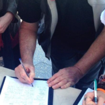People signing petitions