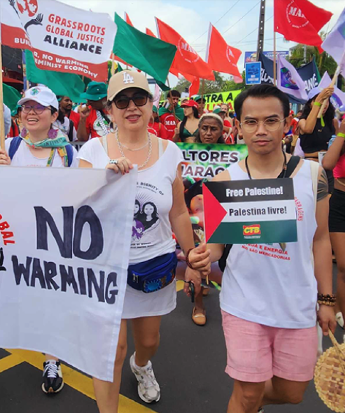 People marching and holding a banner