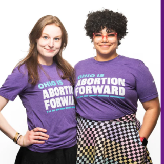 Two women in Abortion Forward shirts