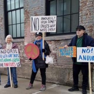 People holding signs