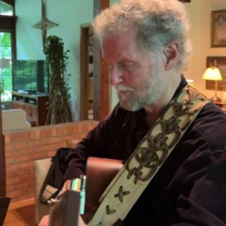 Bill Cohen with guitar