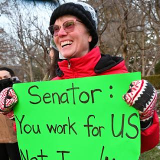 Protestor holding sign