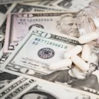 Twenty dollar bills and pills