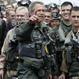 George W Bush with soldiers