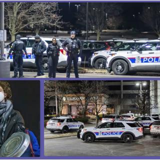 Police cars and officers at protest
