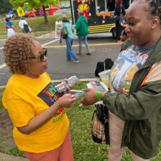 Two black women talking