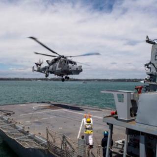 Helicoper landing on naval ship