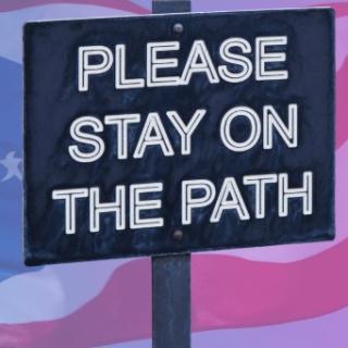 Sign says Please Stay on the Path