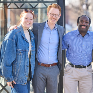 Jesse Vogel with four volunteers